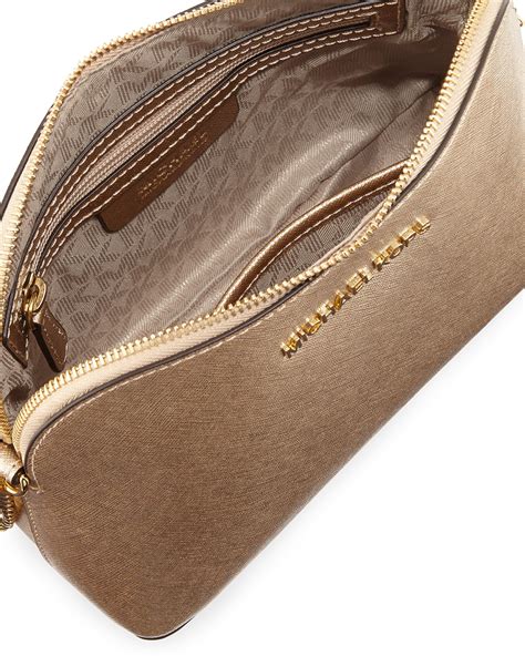 michael kors gold crossbody bag.